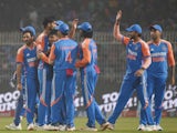 India celebrate taking a wicket against England in January 2025.