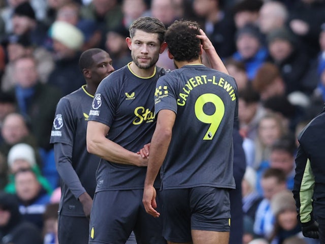 Everton's James Tarkowski shakes hands with Dominic Calvert-Lewin as the striker is substituted on January 25, 2025