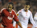 Liverpool's Glen Johnson and Lille's Eden Hazard pictured on March 18, 2010