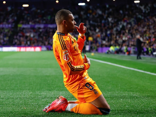 Real Madrid's Kylian Mbappe celebrates scoring against Real Valladolid on January 25, 2025