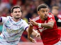 Bournemouth's Lewis Cook in action with Nottingham Forest's Morgan Gibbs-White on August 17, 2024