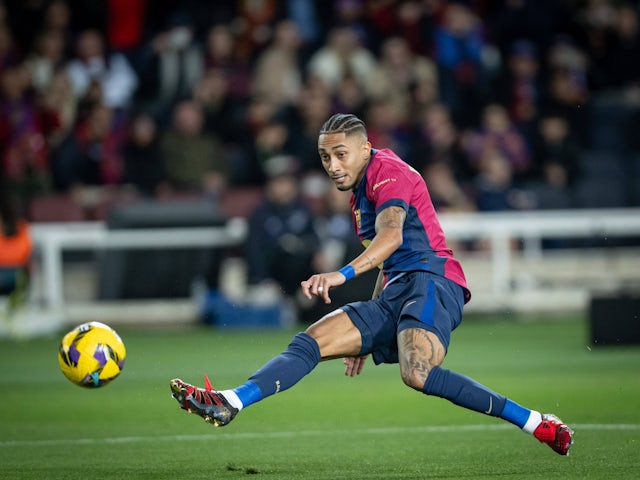 Barcelona's Raphinha scores against Valencia on January 26, 2025