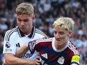 Fulham's Emile Smith Rowe in action with Newcastle United's Anthony Gordon on September 21, 2024