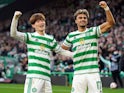 Jota and Kyogo Furuhashi celebrate for Celtic on October 19, 2021