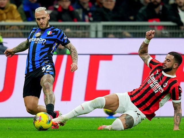 Inter Milan's Federico Dimarco with AC Milan's Kyle Walker, on February 2, 2025