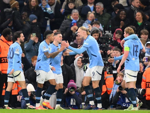 Manchester City players celebrate after scoring on January 29, 2025