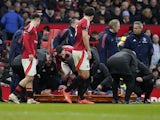 Manchester United's Lisandro Martinez is stretchered off on February 2, 2025