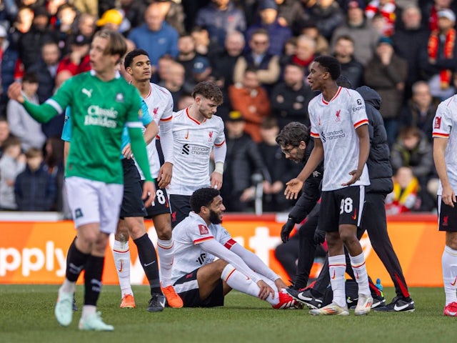 Liverpool's Joe Gomez goes down with an injury during his side's FA Cup match against Plymouth Argyle, on February 9, 2025