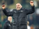 Caretaker manager of Derby County Matt Hamshaw celebrates with fans after the team's draw with Norwich City, on February 8, 2025