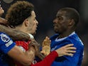 Liverpool's Curtis Jones and Everton's Abdoulaye Doucoure square up on February 12, 2015