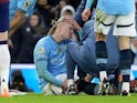 Manchester City's Erling Haaland receives treatment for an injury on February 15, 2025