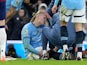 Manchester City's Erling Haaland receives treatment for an injury on February 15, 2025