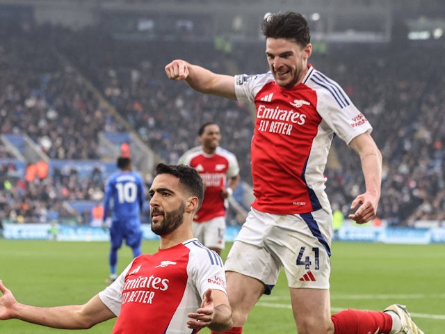 Arsenal's Mikel Merino celebrates scoring with Declan Rice on February 15, 2025