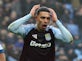 McKenna's 10-man Ipswich show impressive grit in draw at Villa Park