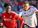 Nottingham Forest's Ola Aina in action with Fulham's Rodrigo Muniz on September 28, 2024