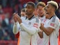 Fulham's Reiss Nelson applauds supporters on September 28, 2024