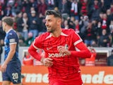 Vincenzo Grifo celebrates scoring for Freiburg on February 8, 2025