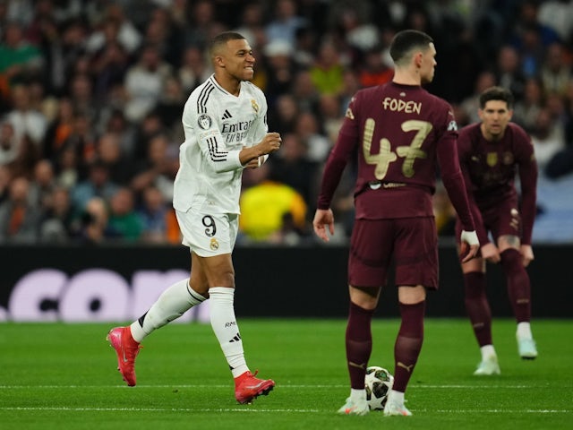 Real Madrid's Kylian Mbappe celebrates scoring against Manchester City on February 19, 2025