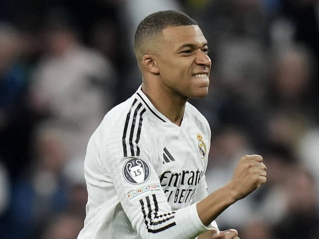 Real Madrid's Kylian Mbappe celebrates scoring against Manchester City on February 19, 2025