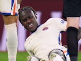 Chelsea's Trevoh Chalobah reacts after sustaining an injury on February 22, 2025