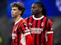 Joao Felix and Rafael Leao of AC Milan look dejected on February 18, 2025