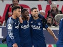 Desire Doue, Ousmane Dembele, Achraf Hakimi celebrate a goal for Paris Saint-Germain in January 2025.